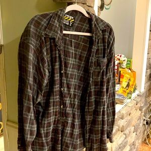 Upcycled flannel shirt with up cycled Rolling Stones logo on back